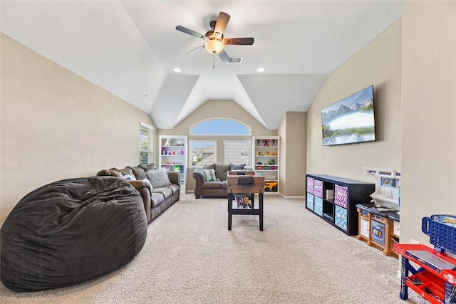 27710 Bering Crossing Dr, Katy, TX 77494 - living room with carpet floors, a ceiling fan, and lofted ceiling