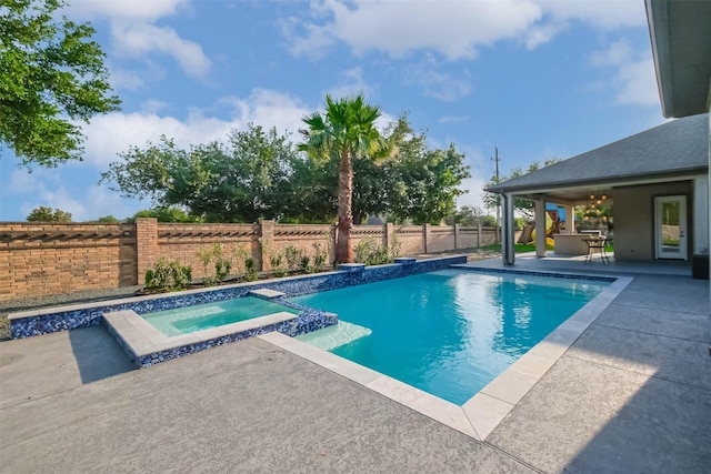 3322 Mallard Run Ct, Katy, TX 77494 - view of pool with a patio area, a fenced backyard, and a pool with connected hot tub
