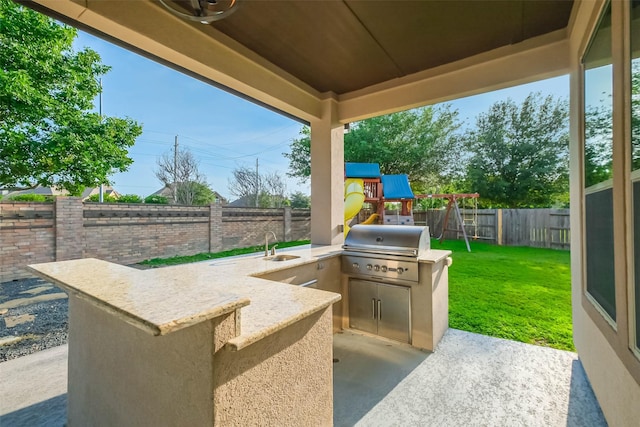 3322 Mallard Run Ct, Katy, TX 77494 - view of patio with a playground and a sink