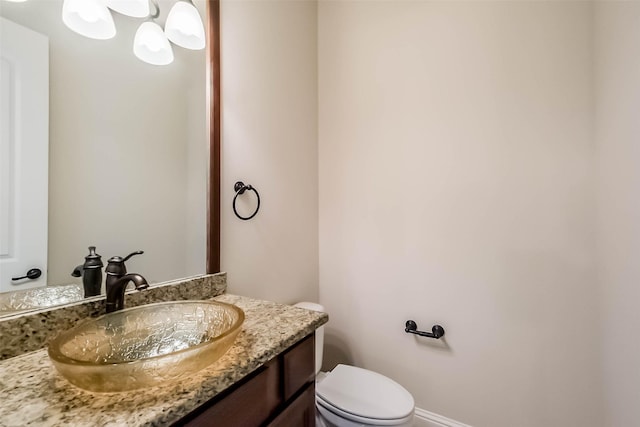 3322 Mallard Run Ct, Katy, TX 77494 - half bath featuring toilet, vanity, and baseboards