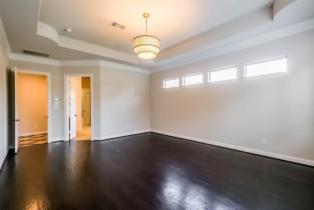3322 Mallard Run Ct, Katy, TX 77494 - empty room with a raised ceiling, healthy amount of natural light, ornamental molding, wood finished floors, and baseboards