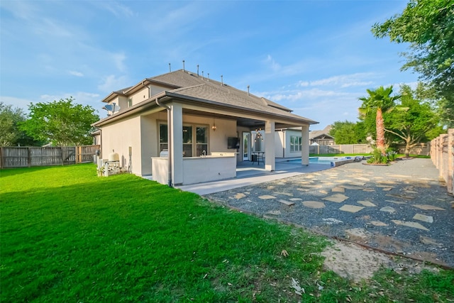 3322 Mallard Run Ct, Katy, TX 77494 - rear view of house with stucco siding and a patio