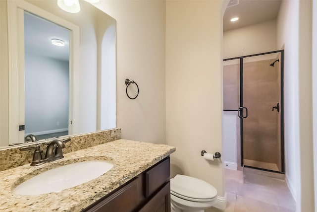 3322 Mallard Run Ct, Katy, TX 77494 - full bathroom featuring a stall shower, toilet, vanity, tile patterned flooring, and baseboards