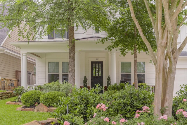 151 Jacks Corner Dr, Montgomery, TX 77316 - property entrance featuring covered porch and an attached garage