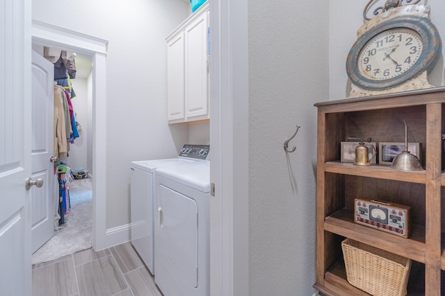 151 Jacks Corner Dr, Montgomery, TX 77316 - washroom featuring cabinet space, independent washer and dryer, and baseboards