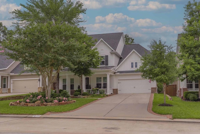 151 Jacks Corner Dr, Montgomery, TX 77316 - craftsman-style house featuring driveway, a front lawn, brick siding, board and batten siding, and a shingled roof