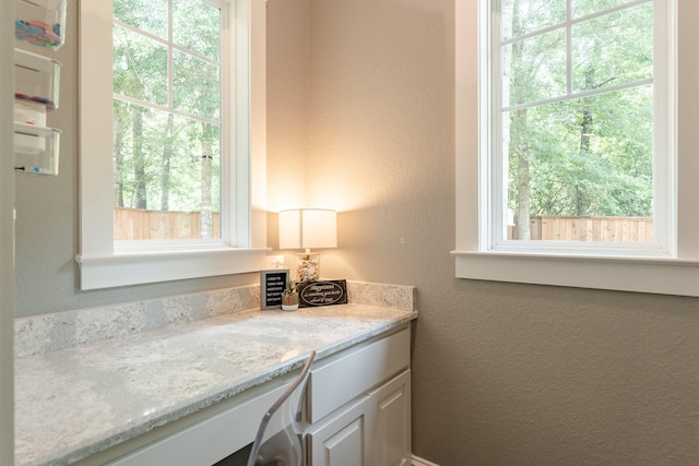 151 Jacks Corner Dr, Montgomery, TX 77316 - bathroom featuring plenty of natural light, a textured wall, and vanity