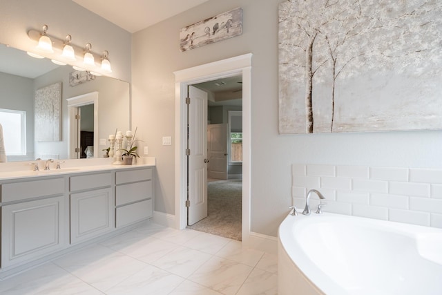 151 Jacks Corner Dr, Montgomery, TX 77316 - full bath with vanity, a bath, marble finish flooring, and baseboards