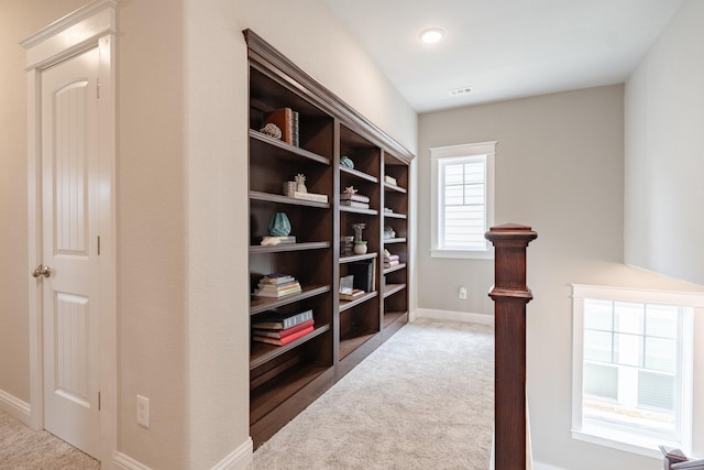 151 Jacks Corner Dr, Montgomery, TX 77316 - hall with an upstairs landing, baseboards, and carpet floors