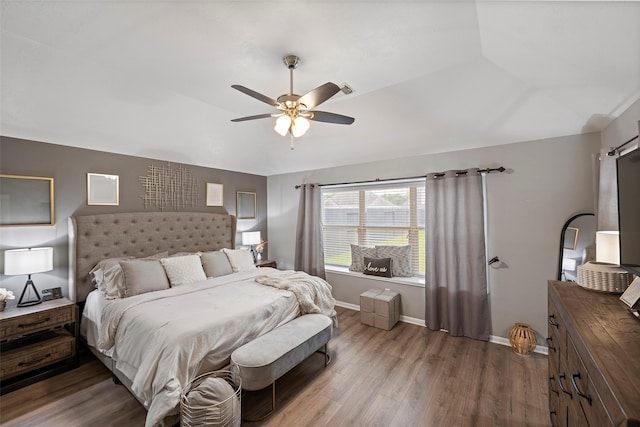 2506 Abernathy Glen Ct, Houston, TX 77014 - bedroom with wood finished floors, baseboards, a ceiling fan, and vaulted ceiling