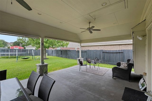 2506 Abernathy Glen Ct, Houston, TX 77014 - view of patio with a ceiling fan and a playground