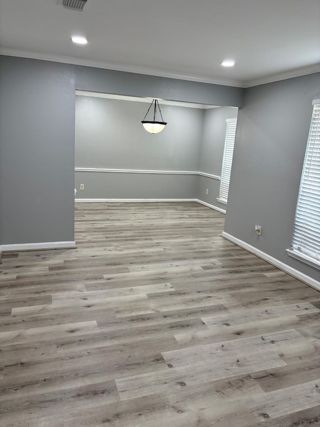 815 Pebbleshire Dr, Houston, TX 77062 - empty room featuring crown molding, baseboards, wood finished floors, and recessed lighting