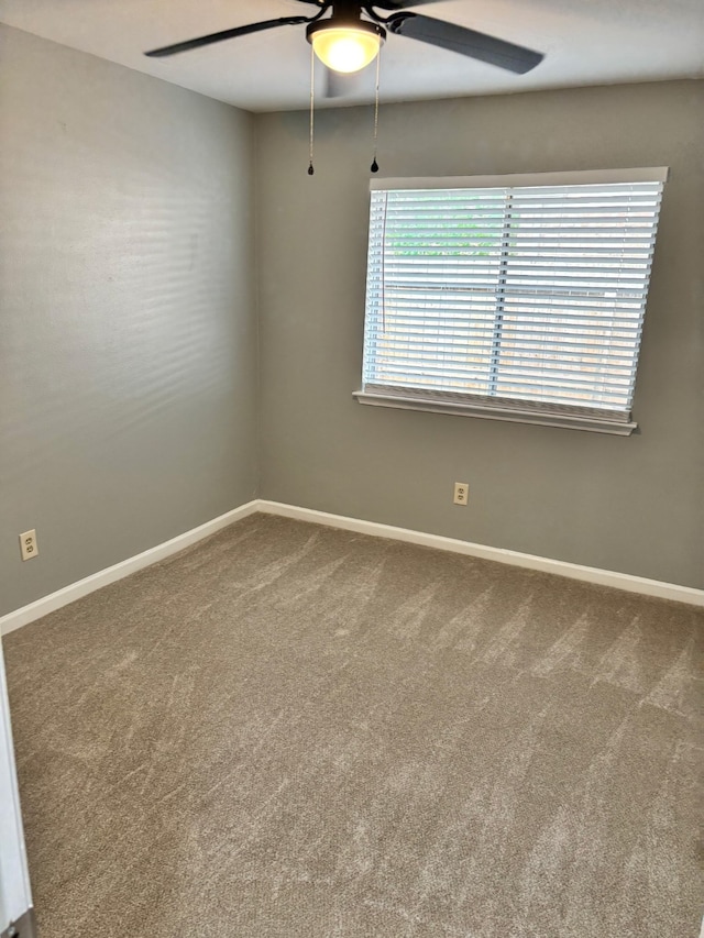 815 Pebbleshire Dr, Houston, TX 77062 - carpeted empty room featuring a ceiling fan and baseboards