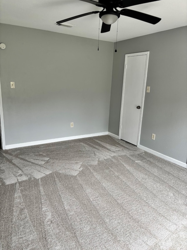815 Pebbleshire Dr, Houston, TX 77062 - carpeted spare room featuring a ceiling fan and baseboards