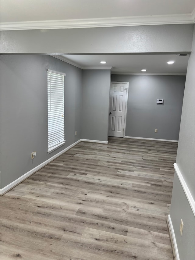 815 Pebbleshire Dr, Houston, TX 77062 - spare room with wood finished floors, ornamental molding, recessed lighting, and baseboards