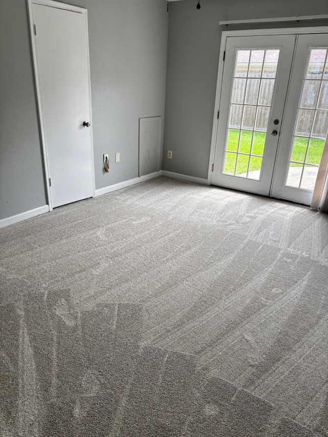 815 Pebbleshire Dr, Houston, TX 77062 - carpeted spare room with plenty of natural light, french doors, and baseboards