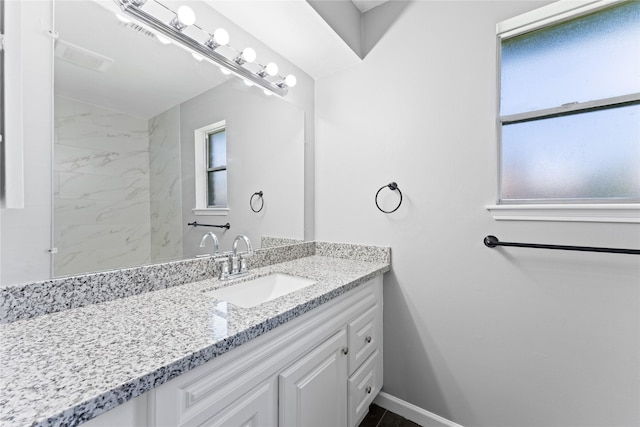 815 Pebbleshire Dr, Houston, TX 77062 - bathroom with plenty of natural light, vanity, and baseboards