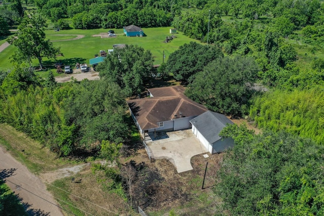 403 Fern Ln, Wharton, TX 77488 - view from above of property with a heavily wooded area
