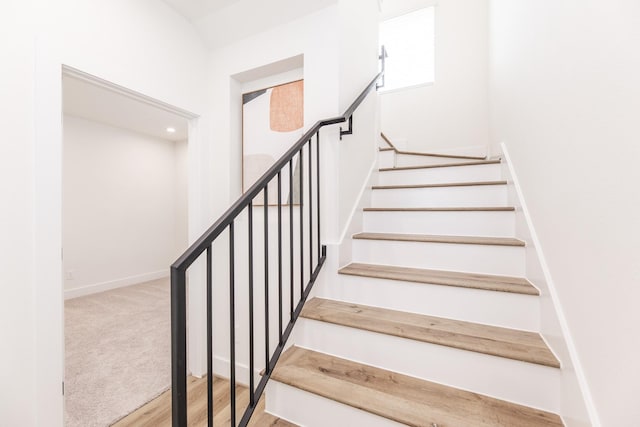 1613 Erin St, Houston, TX 77009 - stairs with baseboards and wood finished floors