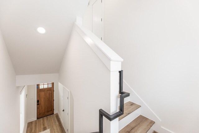 1613 Erin St, Houston, TX 77009 - stairs featuring wood finished floors
