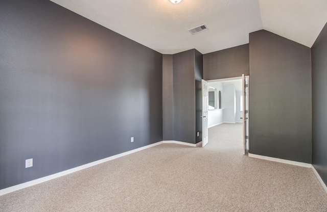 6410 Drayton Hall, Missouri City, TX 77459 - empty room featuring carpet floors, baseboards, and lofted ceiling