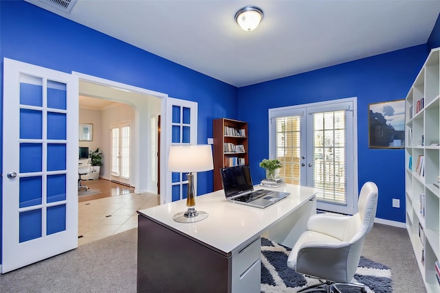 6410 Drayton Hall, Missouri City, TX 77459 - carpeted office space with french doors, arched walkways, tile patterned floors, and baseboards