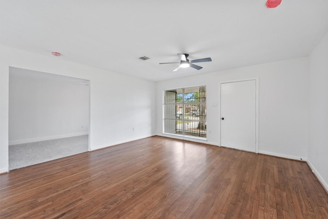 2635 Dragonwick Dr, Houston, TX 77045 - unfurnished room with ceiling fan, wood finished floors, and baseboards