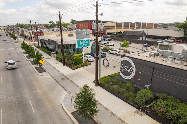 724 W 24th St, Houston, TX 77008 - view of asphalt street with sidewalks, street lighting, curbs, and traffic signs
