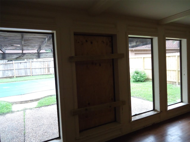 3823 Kiamesha Dr, Missouri City, TX 77459 - doorway with hardwood / wood-style floors and beam ceiling