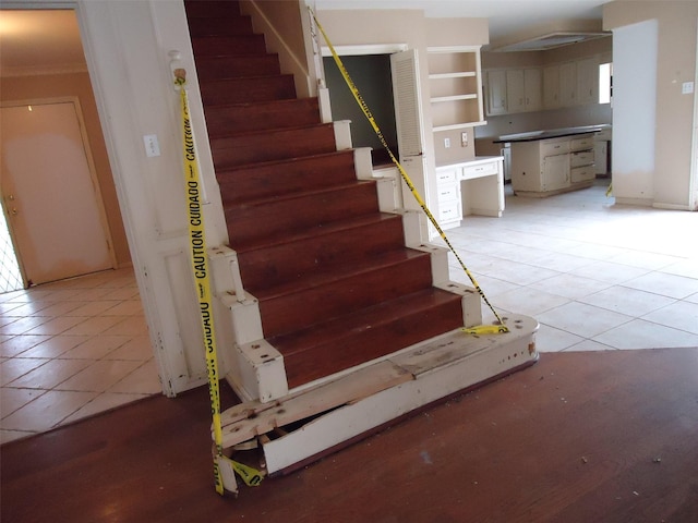 3823 Kiamesha Dr, Missouri City, TX 77459 - staircase featuring tile patterned flooring and ornamental molding