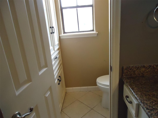 3823 Kiamesha Dr, Missouri City, TX 77459 - bathroom with tile patterned floors, toilet, and baseboards