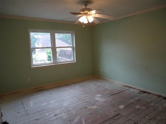 3823 Kiamesha Dr, Missouri City, TX 77459 - empty room featuring hardwood / wood-style floors, ceiling fan, baseboards, and crown molding