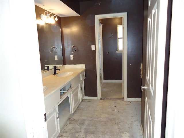3823 Kiamesha Dr, Missouri City, TX 77459 - bathroom featuring baseboards and double vanity