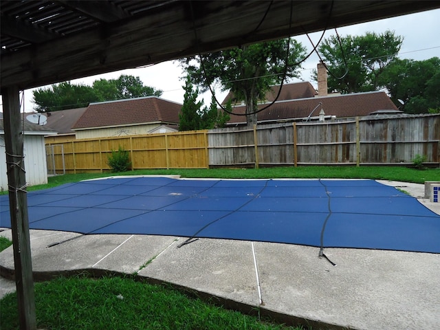 3823 Kiamesha Dr, Missouri City, TX 77459 - view of swimming pool with a fenced backyard, a patio, and a pergola