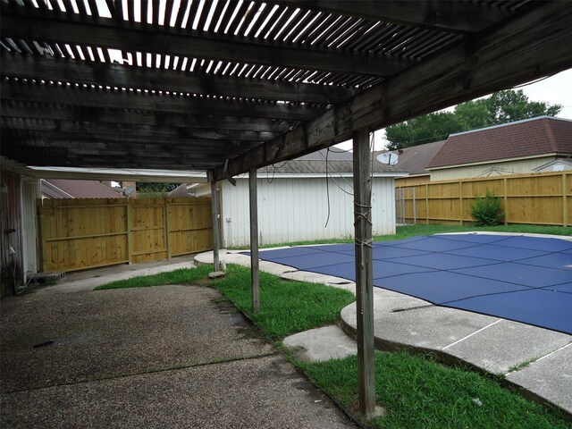 3823 Kiamesha Dr, Missouri City, TX 77459 - fenced backyard with a pergola and an outbuilding