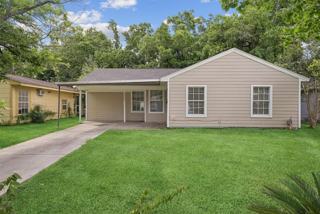 2323 Marshall St, Pasadena, TX 77506 - view of front facade featuring concrete driveway, an attached carport, a front lawn, and a shingled roof
