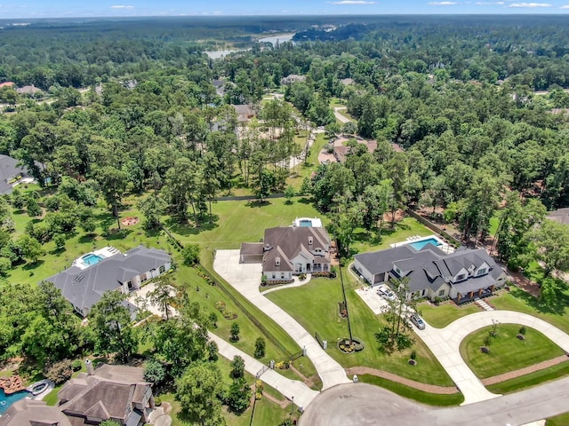 28310 Whispering Maple Way, Spring, TX 77386 - aerial view of property and surrounding area with a heavily wooded area and nearby suburban area