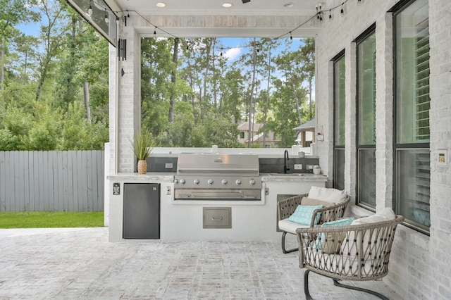 28310 Whispering Maple Way, Spring, TX 77386 - view of patio / terrace with a sink