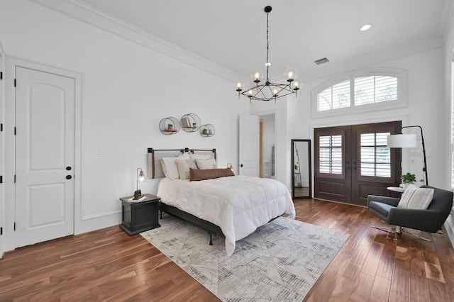 28310 Whispering Maple Way, Spring, TX 77386 - bedroom featuring a chandelier, ornamental molding, wood finished floors, and french doors