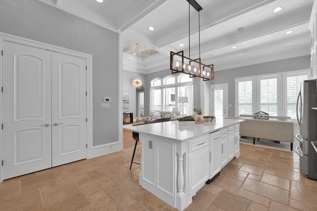 28310 Whispering Maple Way, Spring, TX 77386 - kitchen with stone tile flooring, beamed ceiling, white cabinets, open floor plan, and recessed lighting