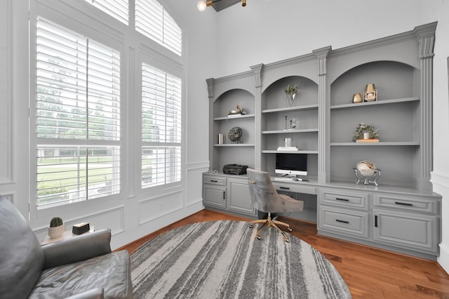 28310 Whispering Maple Way, Spring, TX 77386 - home office featuring built in study area and light wood finished floors
