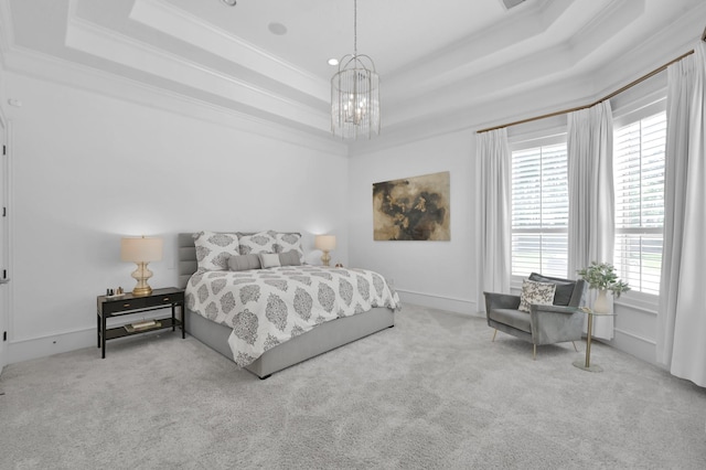 28310 Whispering Maple Way, Spring, TX 77386 - carpeted bedroom featuring a tray ceiling, a chandelier, and crown molding