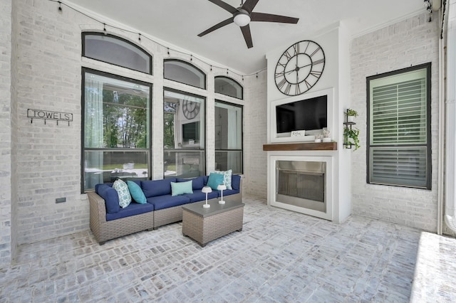 28310 Whispering Maple Way, Spring, TX 77386 - view of patio featuring a ceiling fan and an outdoor living space with a fireplace