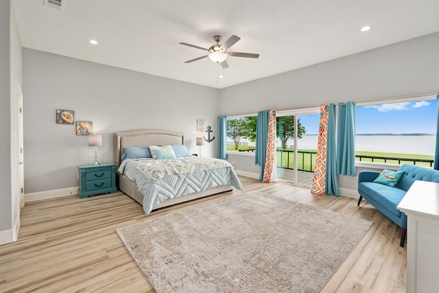 209 Anchor Ranch Rd, Trinidad, TX 75163 - bedroom featuring baseboards, a water view, light wood-style floors, access to exterior, and a ceiling fan