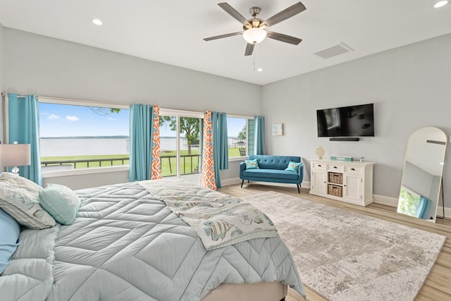 209 Anchor Ranch Rd, Trinidad, TX 75163 - bedroom featuring a water view, wood finished floors, baseboards, recessed lighting, and a ceiling fan
