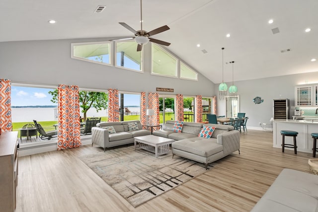 209 Anchor Ranch Rd, Trinidad, TX 75163 - living room featuring high vaulted ceiling, light wood finished floors, a water view, recessed lighting, and a ceiling fan