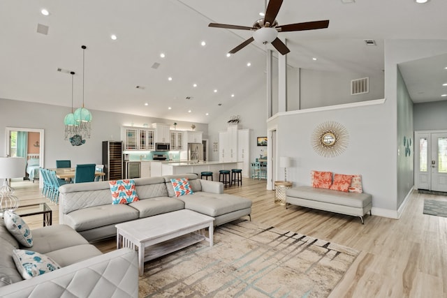209 Anchor Ranch Rd, Trinidad, TX 75163 - living room with high vaulted ceiling, ceiling fan, light wood-type flooring, recessed lighting, and baseboards