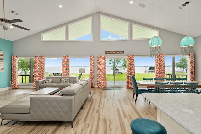209 Anchor Ranch Rd, Trinidad, TX 75163 - living room featuring high vaulted ceiling, ceiling fan, wood finished floors, recessed lighting, and a water view