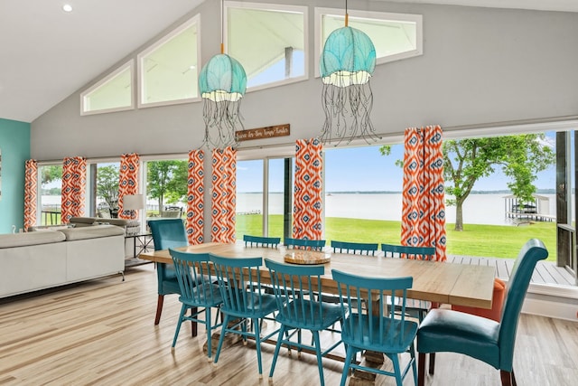 209 Anchor Ranch Rd, Trinidad, TX 75163 - dining room featuring high vaulted ceiling, a water view, wood finished floors, and recessed lighting