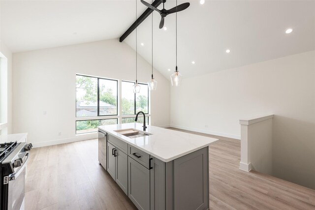 6137 Pacific Forest Dr, Houston, TX 77346 - kitchen with gray cabinetry, a sink, appliances with stainless steel finishes, beamed ceiling, and ceiling fan